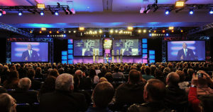 crowd watching the stage at the Sandhill Convention Center